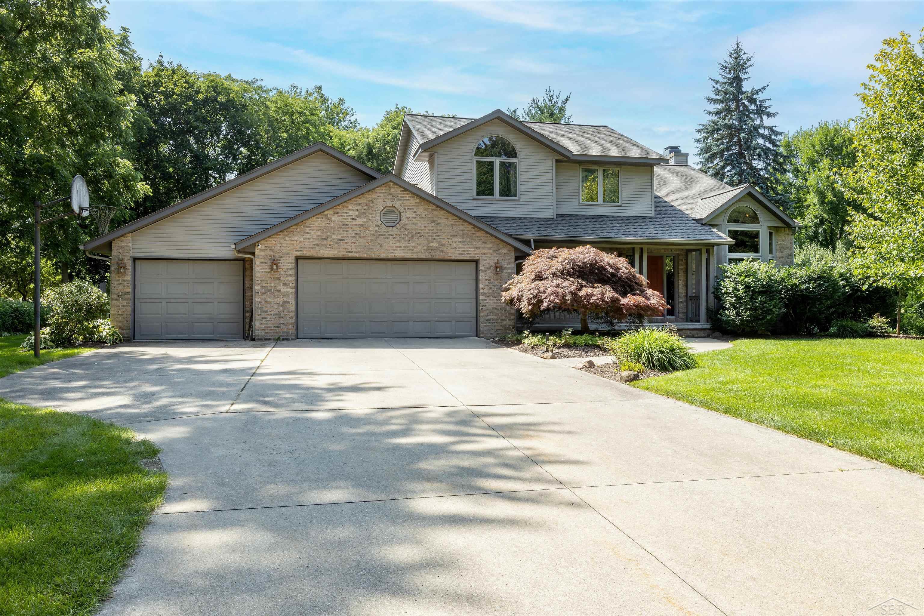 Property Photo: 3703 Orchard Drive MI 48640