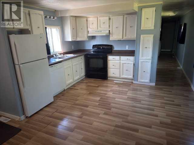 Property Photo: 810 56th Street AB T7E 1P2