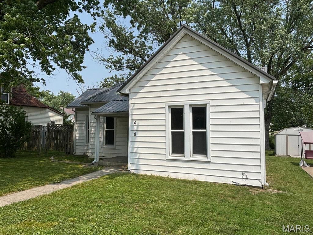 Property Photo:  410 S Main Street  MO 63456 