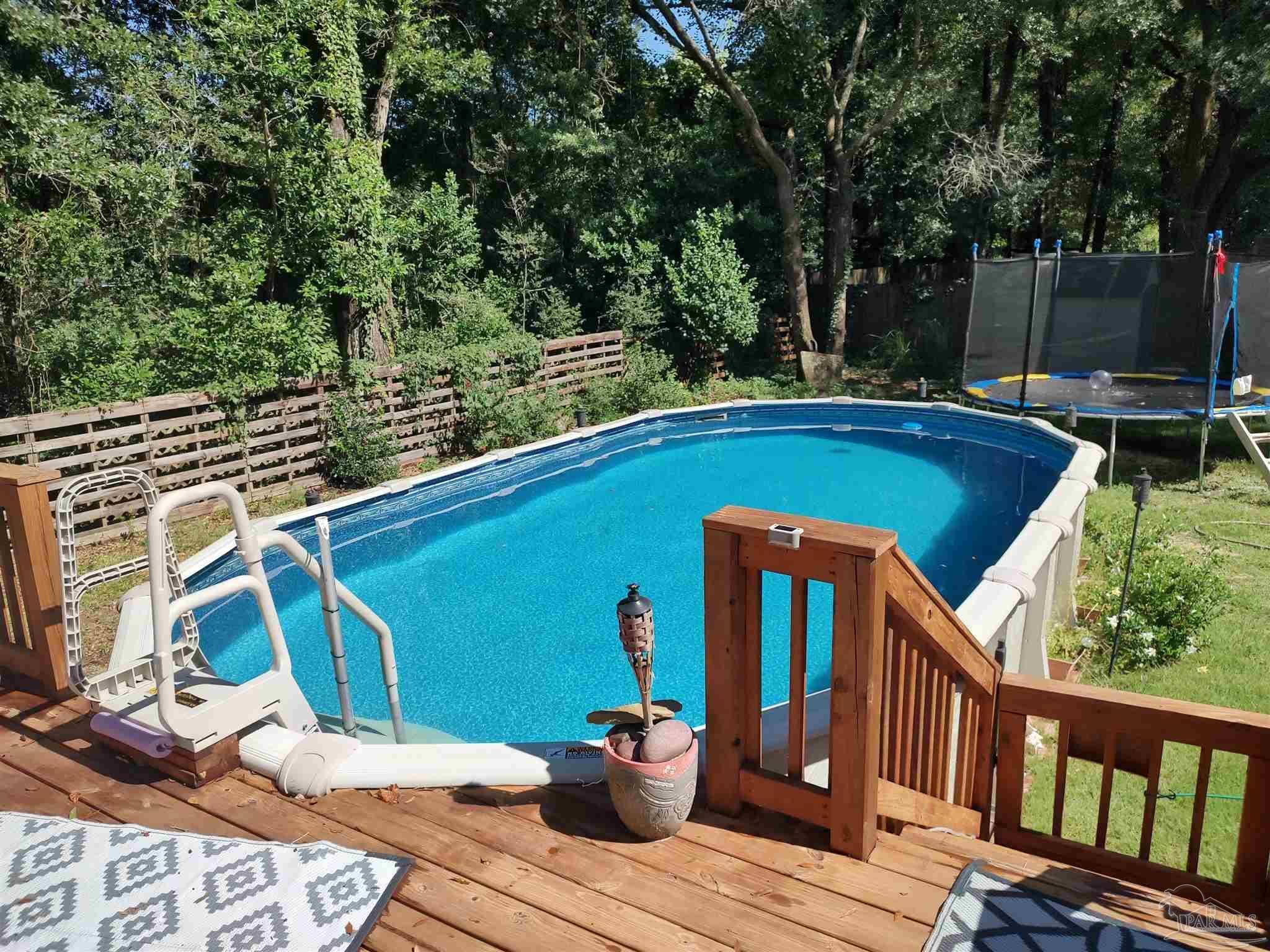 Property Photo:  6108 Arnies Way  FL 32570 