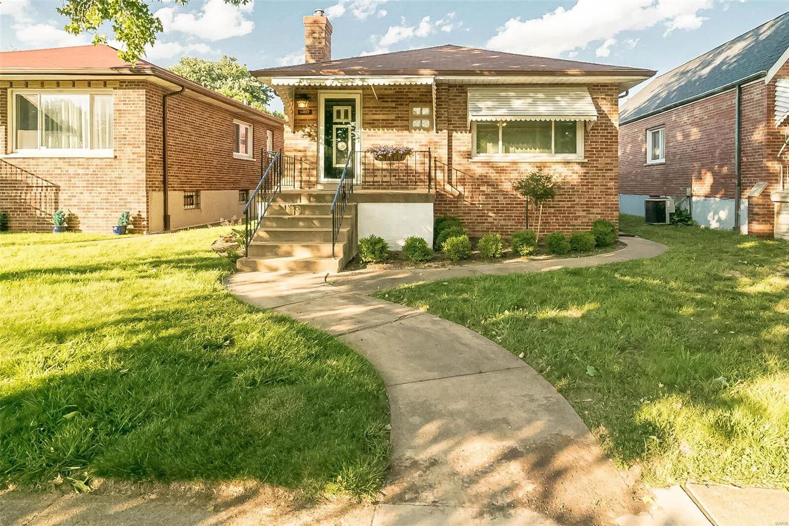 Property Photo: 6407 Lindenwood Place MO 63109