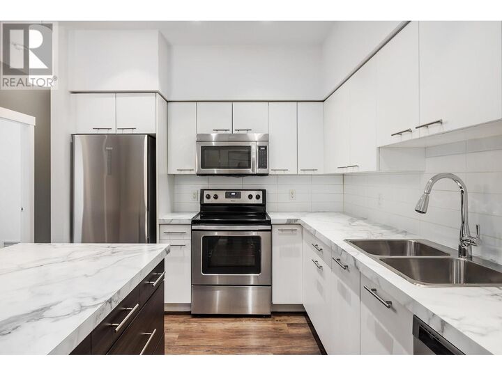 Property Photo: 975 Academy Way 214 BC V1V 3C8