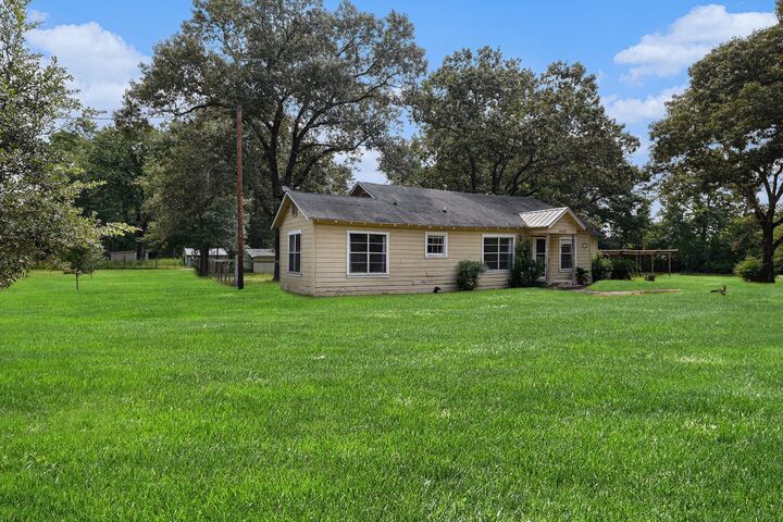 Property Photo: 14145 Bert Brown Rd TX 77302