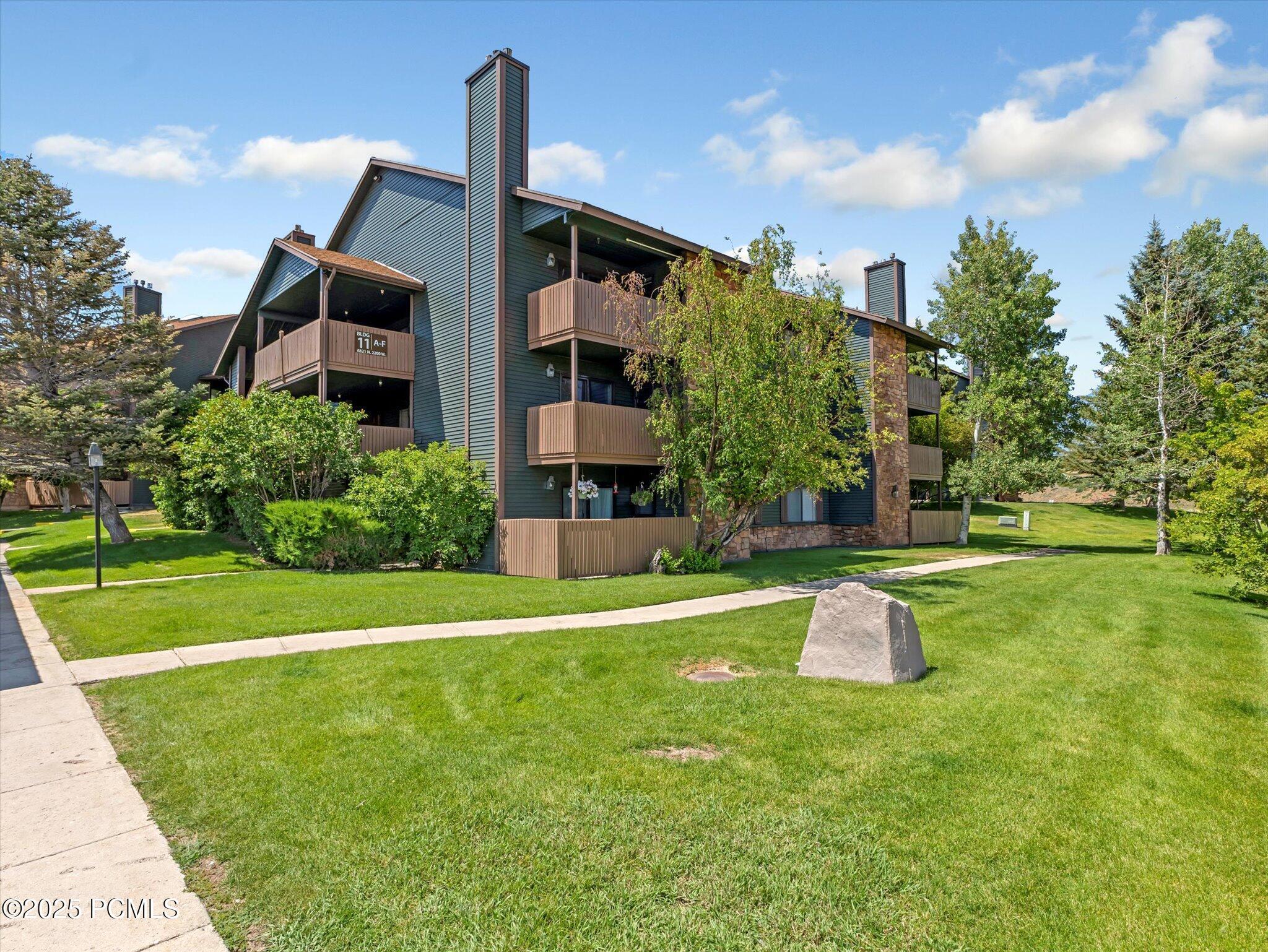 Property Photo: 6821 N 2200 Apt 11 J UT 84098