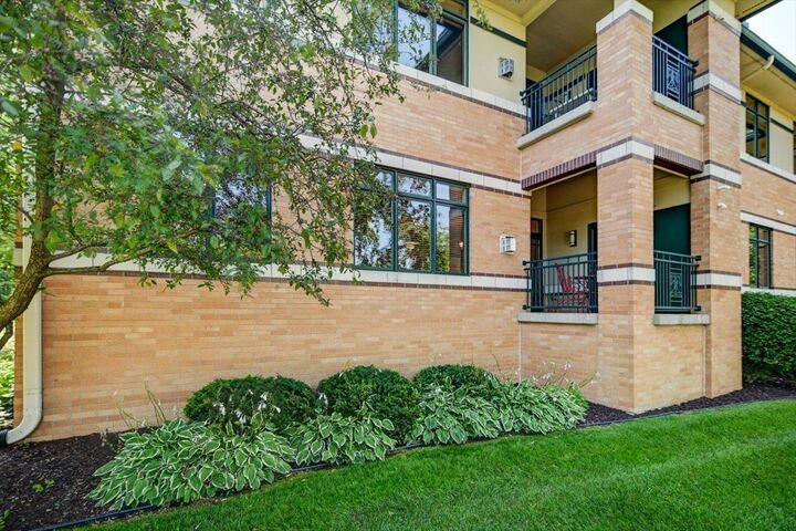 Property Photo: 6767 Frank Lloyd Wright Avenue 103 WI 53562
