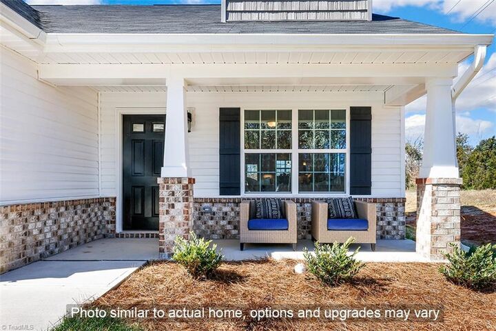 Property Photo:  106 Pineberry Way Lot 36  NC 27410 