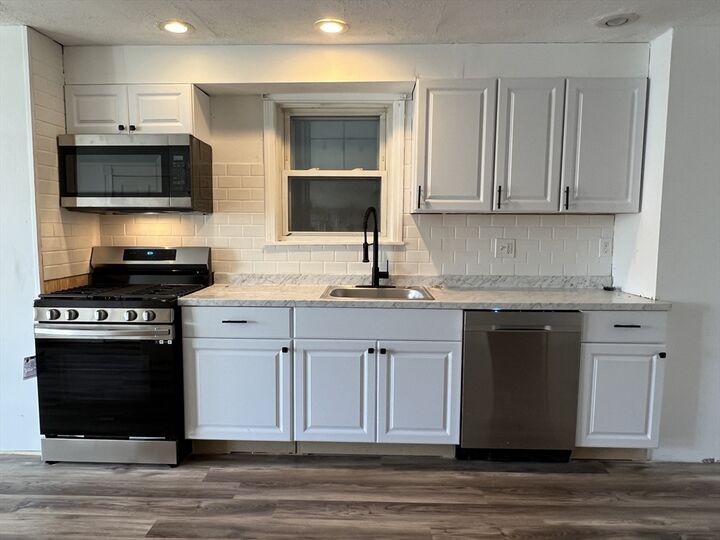 Property Photo:  209 Lexington 1  MA 02128 