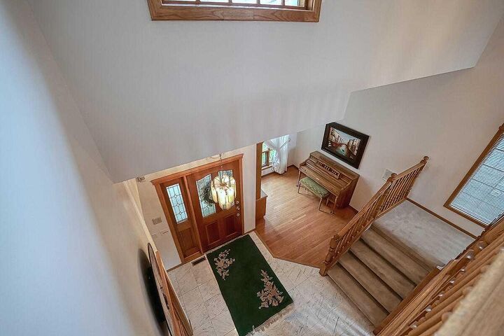 Property Photo:  115 Strathaven Circle SW  AB T3H 2K8 
