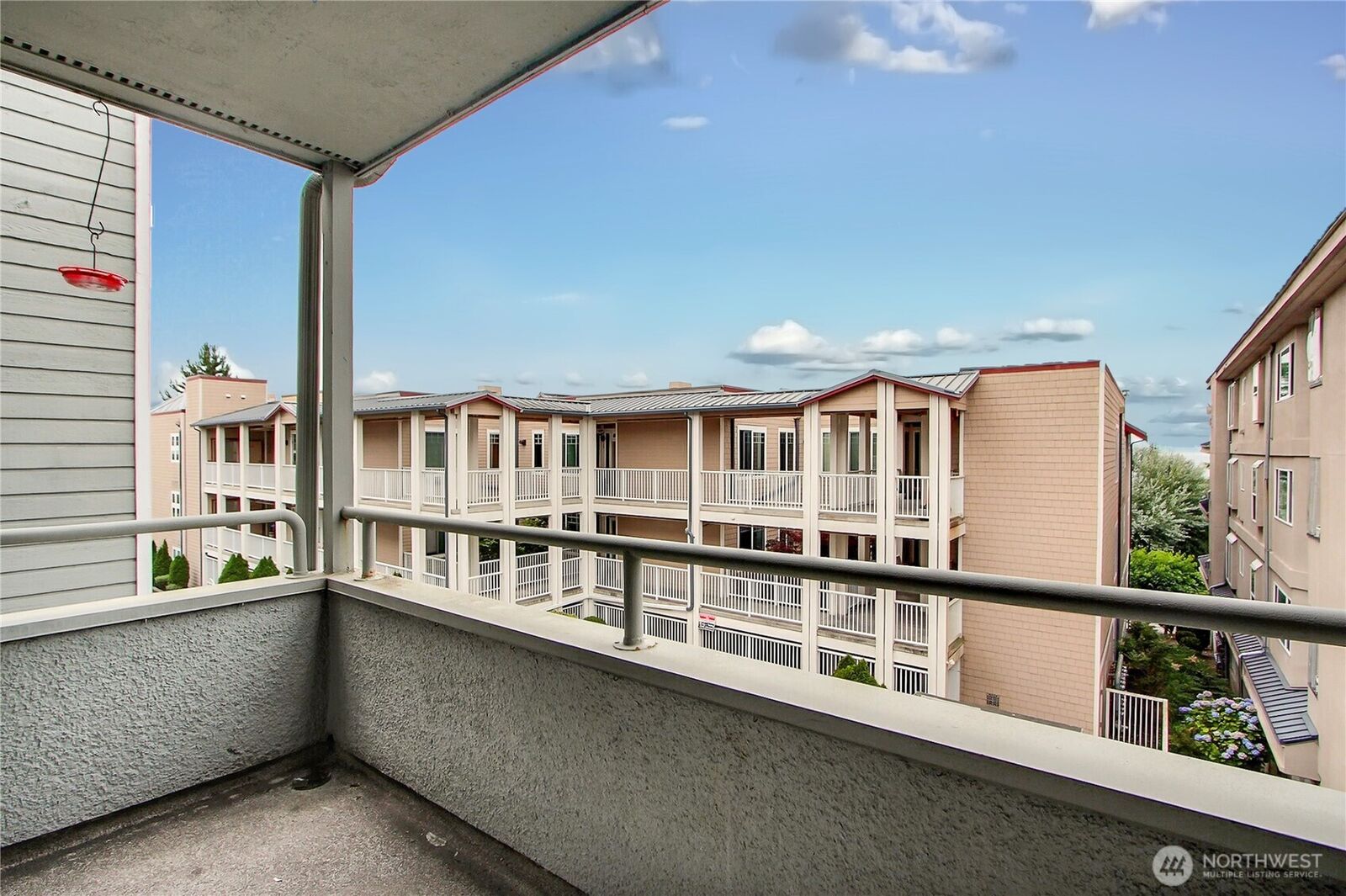 Property Photo:  22211  6th Avenue S 205  WA 98198 