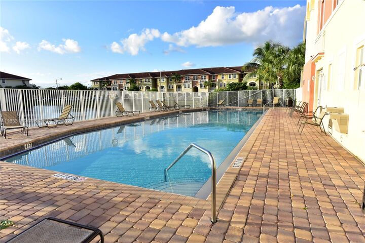 Property Photo: 10850 NW 89th Ter 105-5 FL 33178