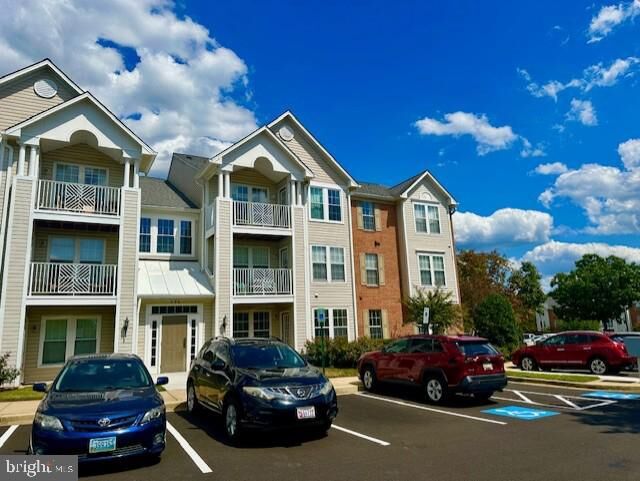 Property Photo: 696 Winding Stream Way 104 MD 21113