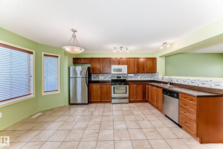Property Photo:  7108 16 Avenue SW  AB T6X 0H3 