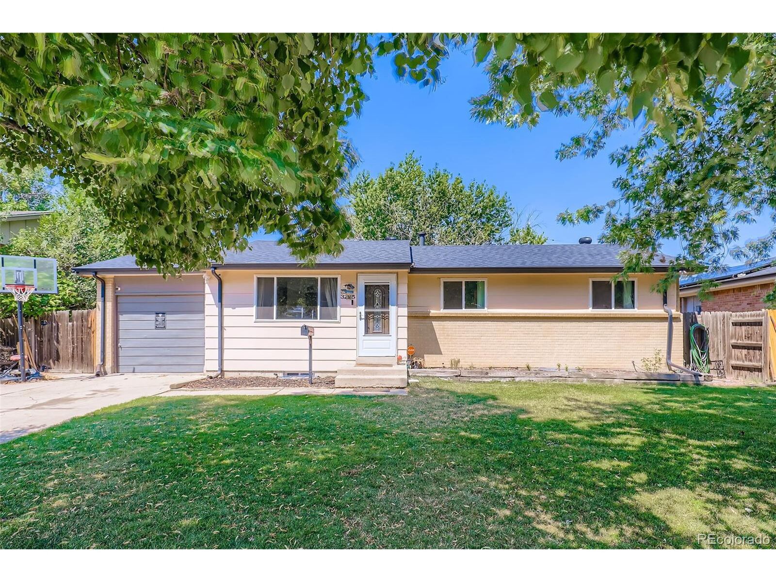 Property Photo:  3225 Carson St  CO 80011 