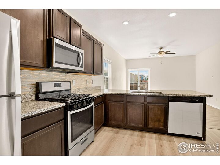 Property Photo:  308 Bowles St  CO 80643 