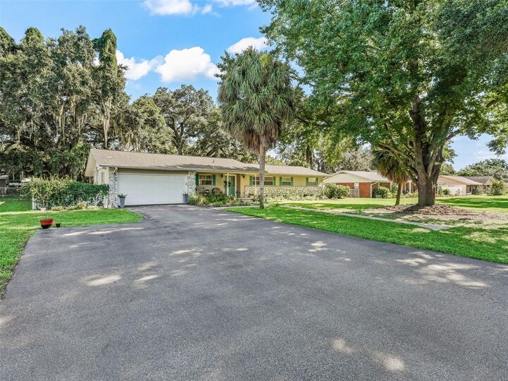 Property Photo:  4872 County Road 117A  FL 34785 