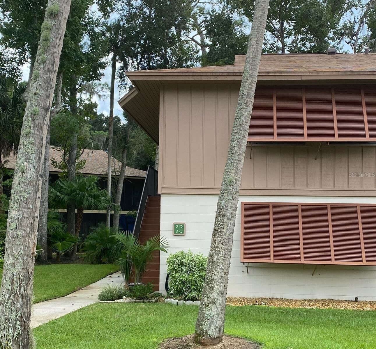 Property Photo:  100 Sweetgum Woods Court 2D  FL 32725 