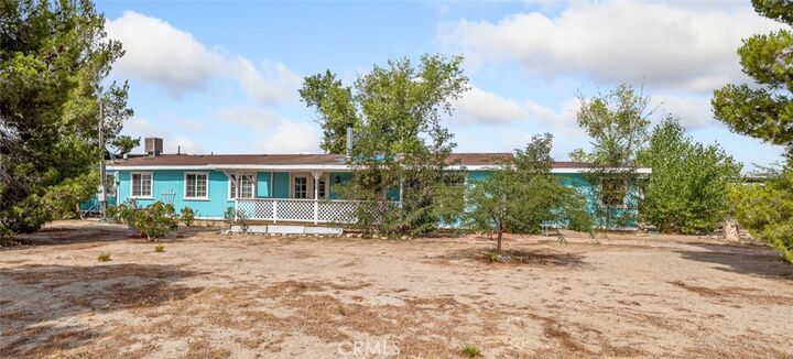 Property Photo:  5124 Luna Road  CA 92371 