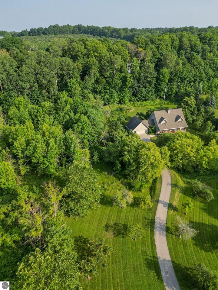 Property Photo:  12142 Peninsula Drive  MI 49686 