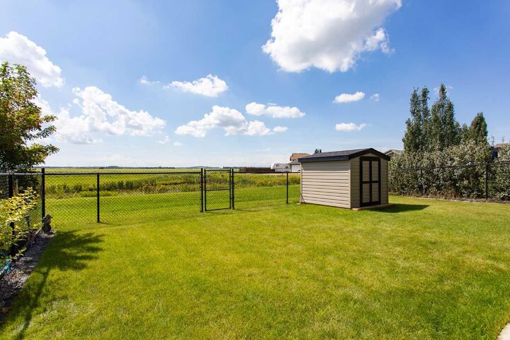 Property Photo: 4546 Iron Wolf Place 22 AB T4L 0G1