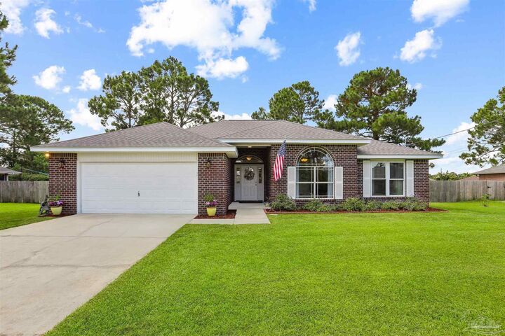 Property Photo:  5735 Farrel Way  FL 32583 