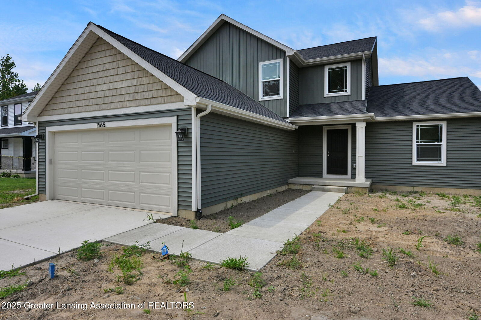 Property Photo: 1565 Thimbleberry Drive MI 48842