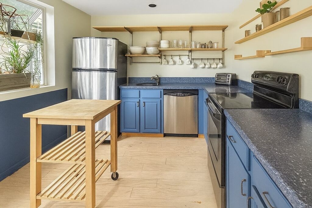 Property Photo:  210 Centre St 14  MA 02169 