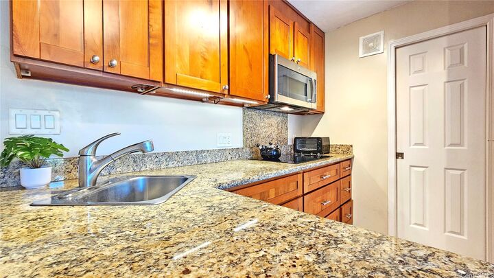 Property Photo:  1459 Pele Street 203  HI 96813 
