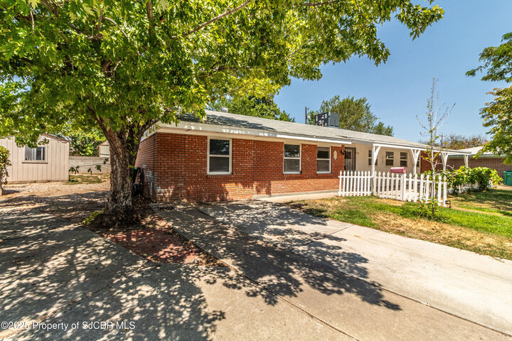 Property Photo: 212 W Sunset Place NM 87401