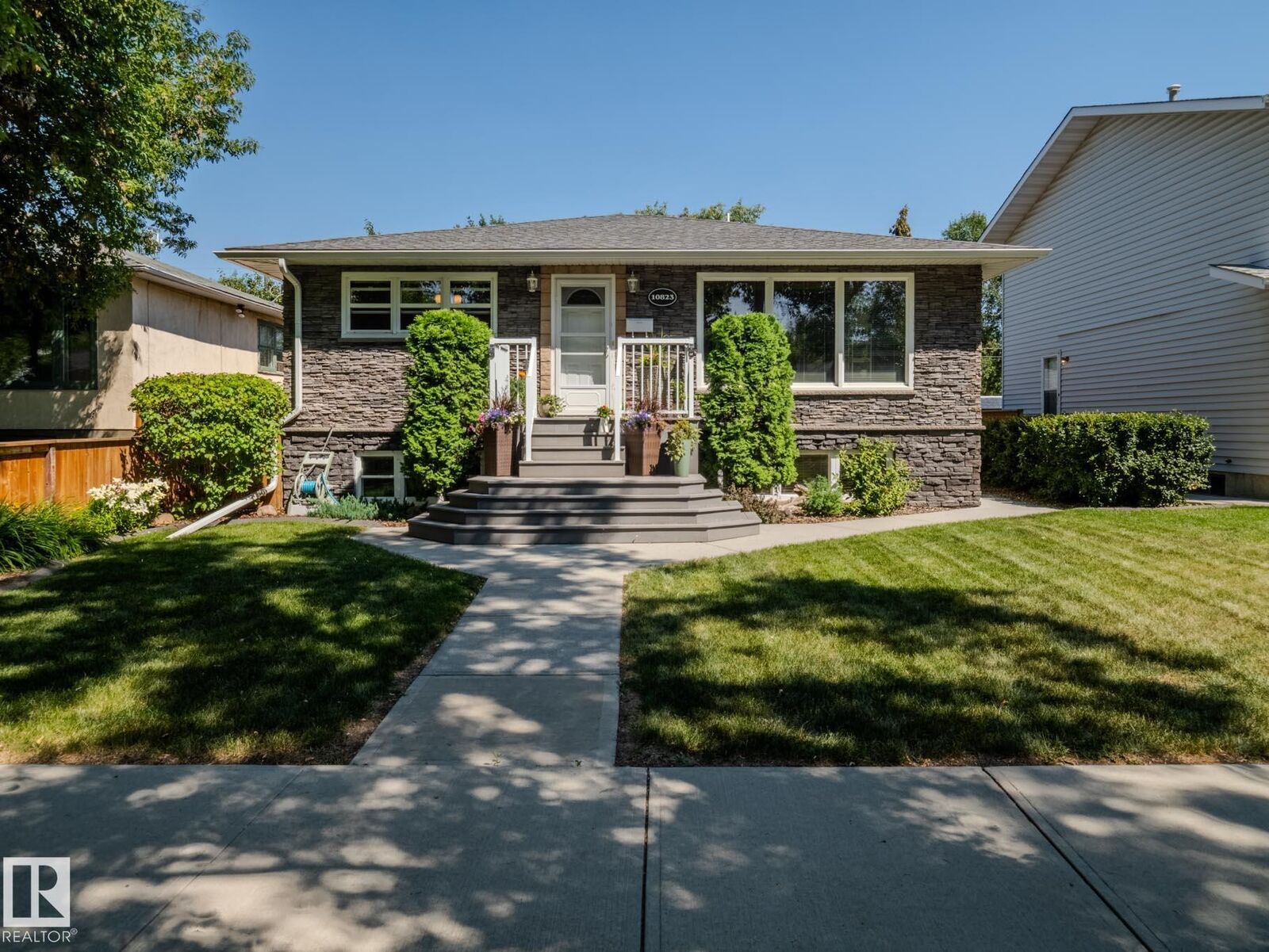 Property Photo:  10823 122 Street NW  AB T5M 0A5 