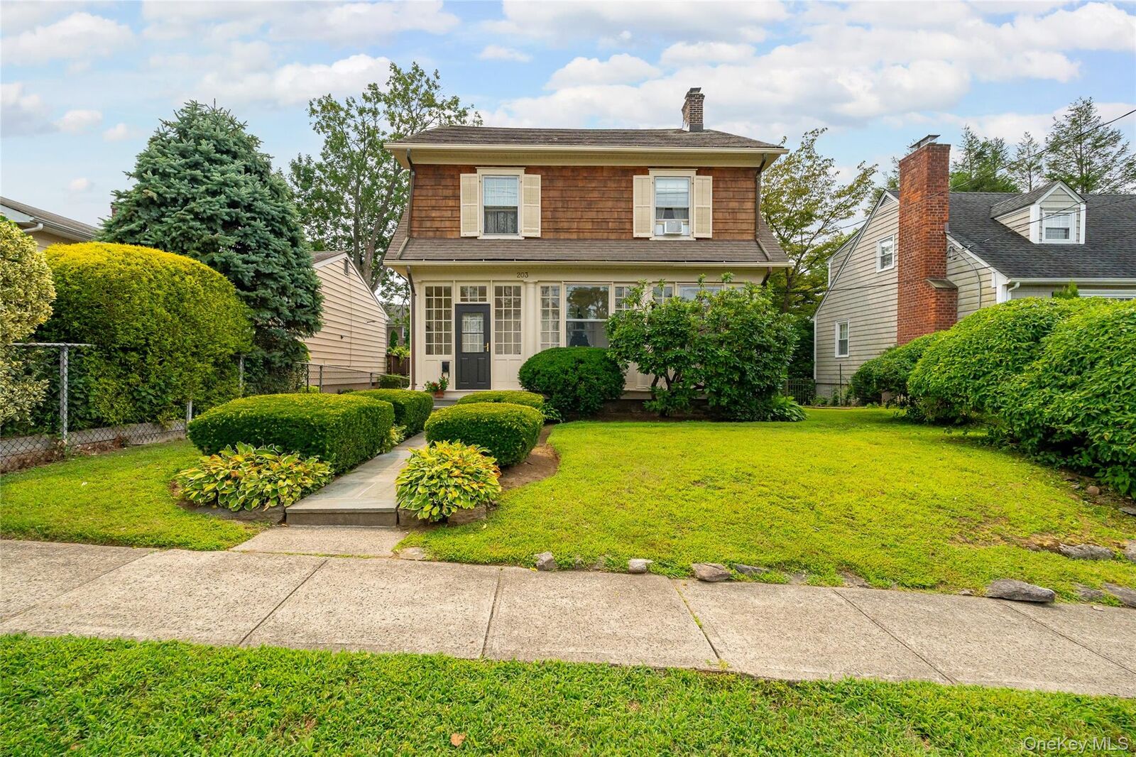 Property Photo:  203 Travers Avenue  NY 10543 