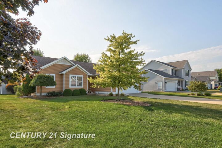 Property Photo: 8421 Waxwing Drive MI 48623
