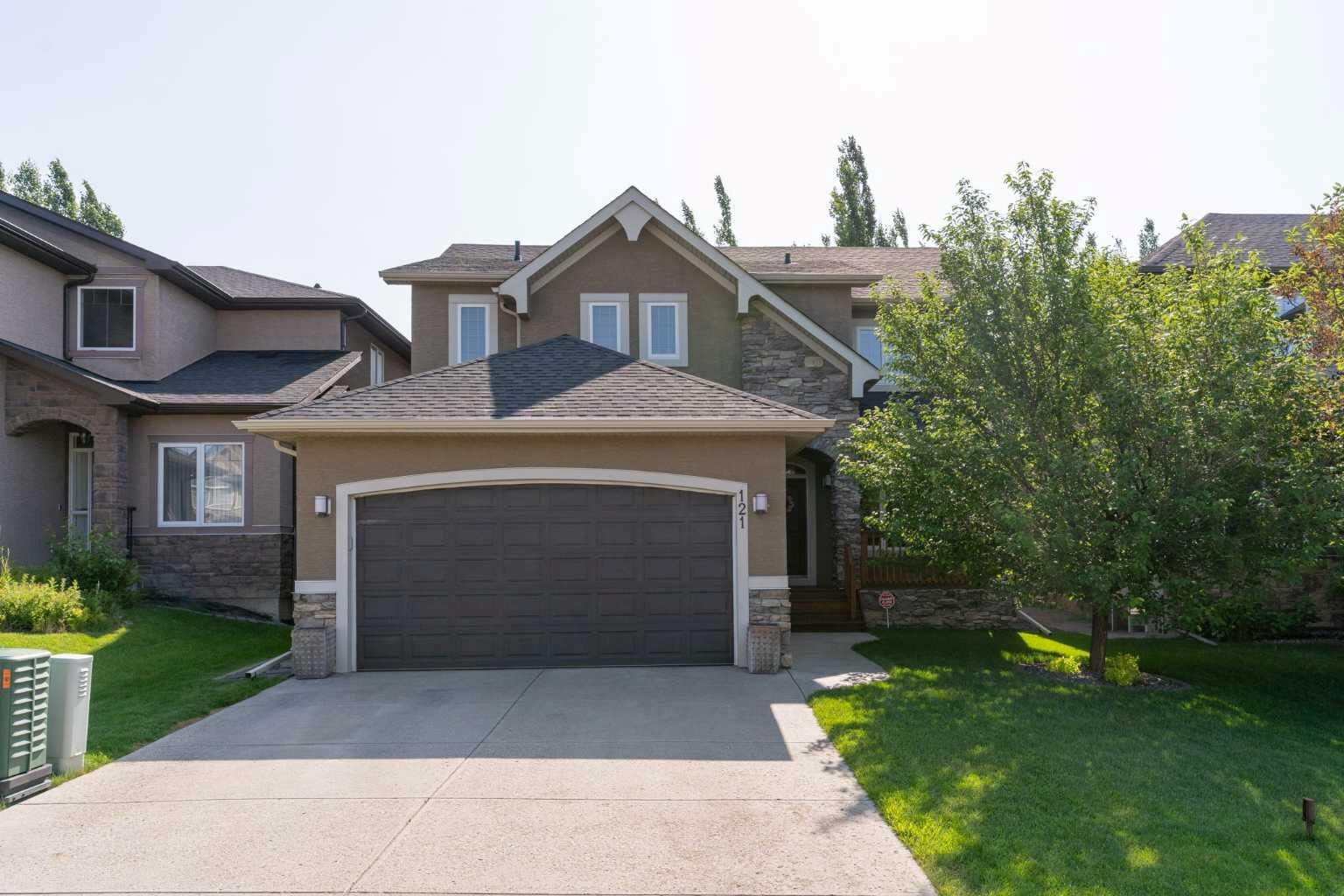 Property Photo:  121 Panatella Green NW  AB T3K 0M6 