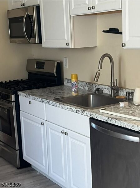 Property Photo:  566 E Milton Ave 1  NJ 07065 
