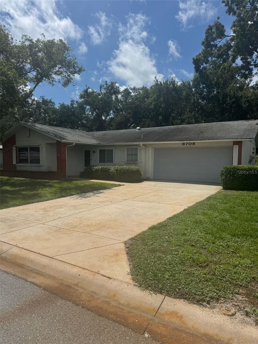 Property Photo:  8708 Benton Drive  FL 34668 