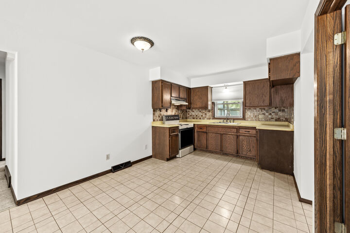 Property Photo:  9036 S 21st St  WI 53154 