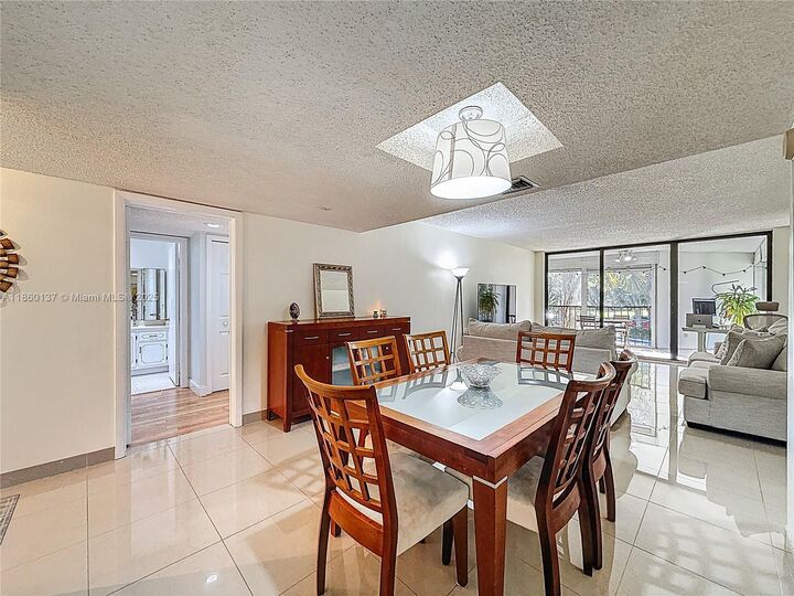 Property Photo:  16475 Golf Club Rd 202  FL 33326 