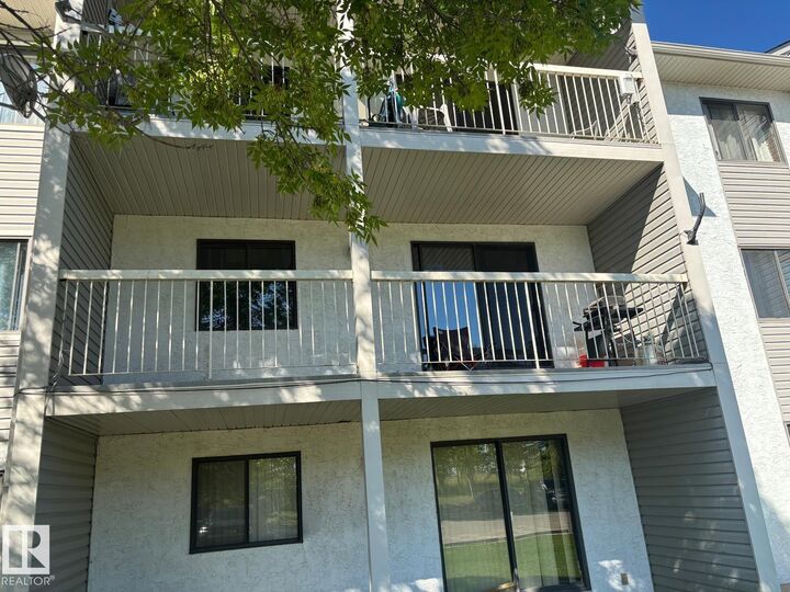 Property Photo: 5705 51 Street 212 AB T0A 1A0