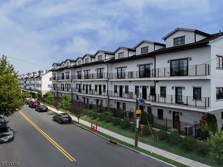 Property Photo:  2 Harbor Front Plz  NJ 07206 
