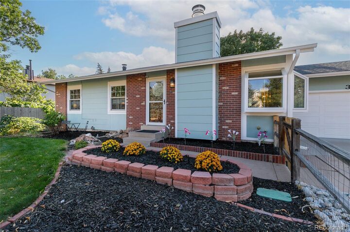 Property Photo: 3687 S Ouray Street CO 80013