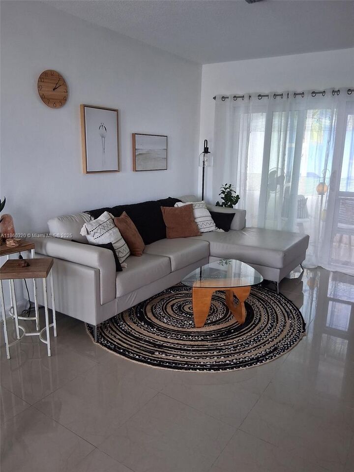 Property Photo:  6560 Winfield Blvd 204  FL 33063 