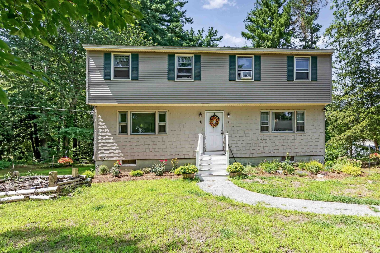 Property Photo: 4 Therriault Avenue NH 03079