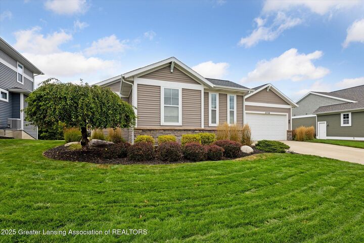 Property Photo:  2726 Kittansett Drive  MI 48864 