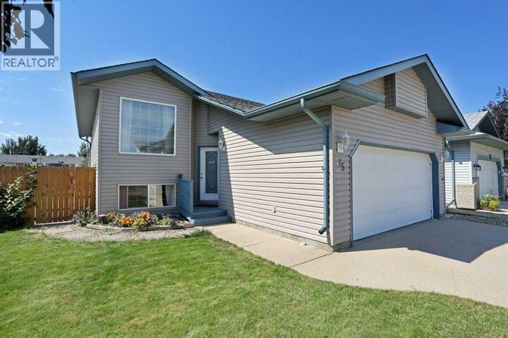 Property Photo: 75 Upland Road West AB T1R 1G7