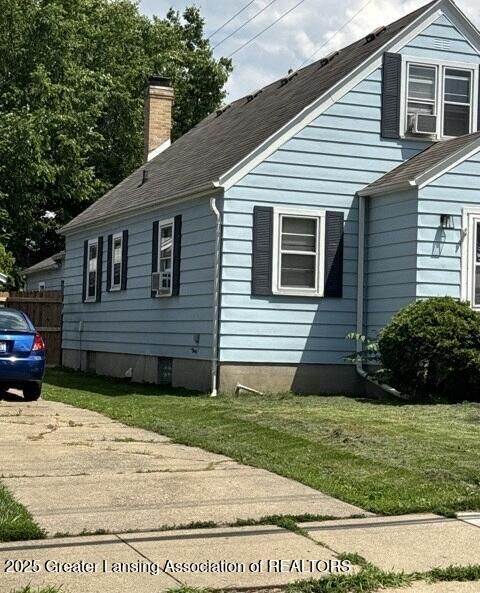 Property Photo:  2345 Lyons Avenue  MI 48910 