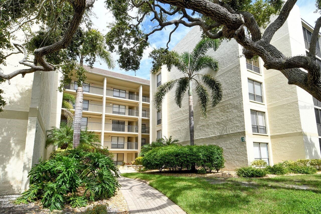 Property Photo:  6157 Midnight Pass Road E63  FL 34242 