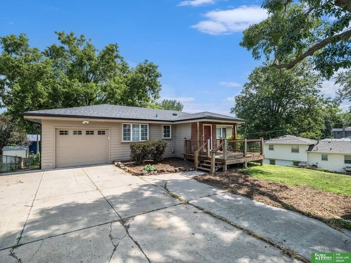 Property Photo: 8209 S 39 Avenue NE 68147