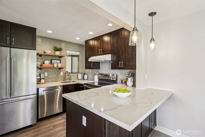 Property Photo:  4800  200th Street SW E 301  WA 98036 