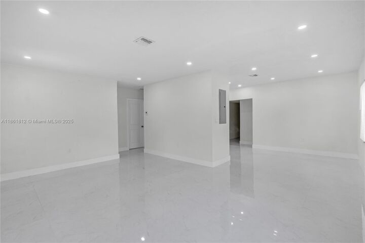 Property Photo: 910 NW 123rd St FL 33168