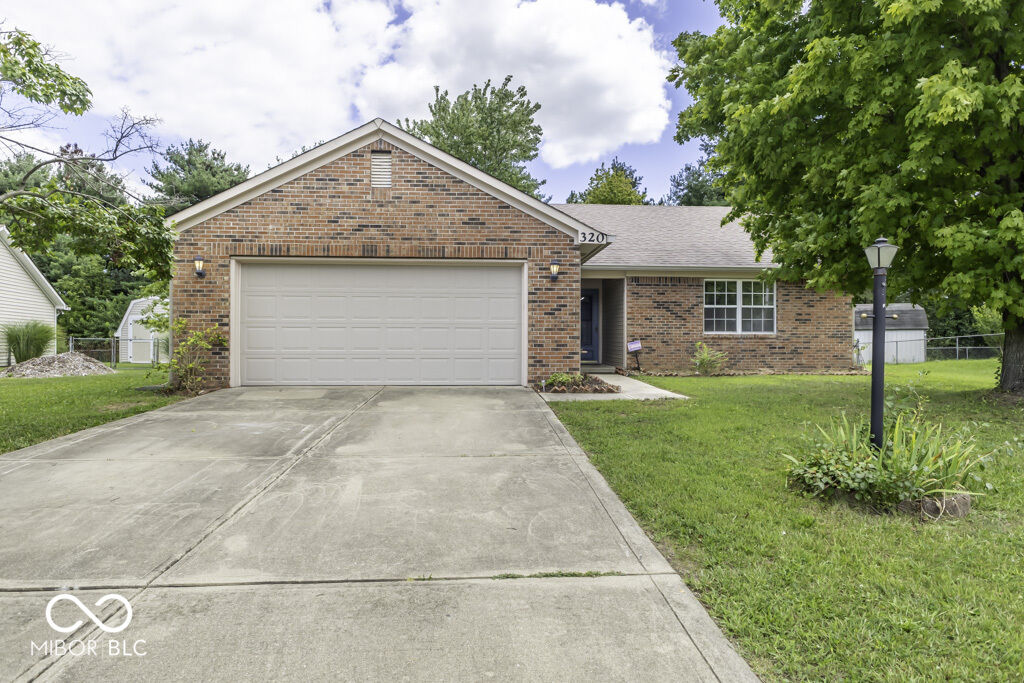 Property Photo:  320 Southway Court  IN 46106 