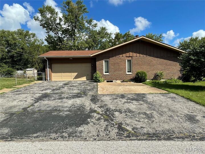 Property Photo: 9803 Balboa Drive MO 63136
